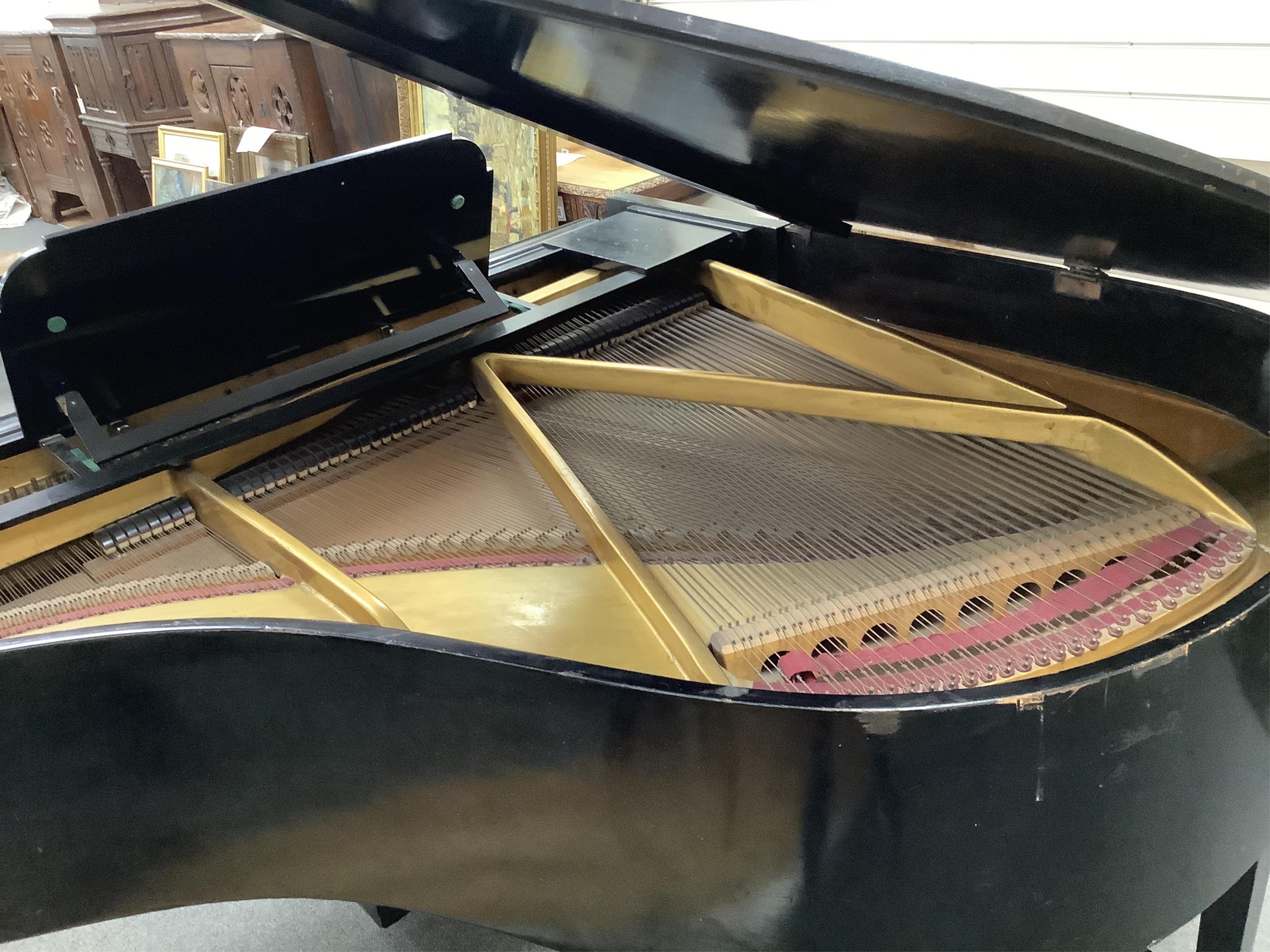 An early 20th century Schumann ebonised boudoir grand piano, length 154cm, width 156cm, height 100cm. Condition - poor